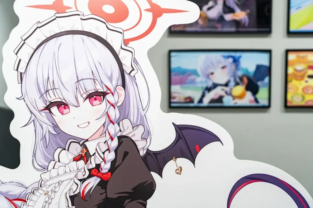 A woman with white hair and red eyes is standing in front of a wall with