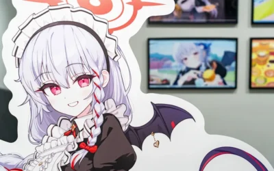 A woman with white hair and red eyes is standing in front of a wall with