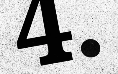 a black letter on a white surface