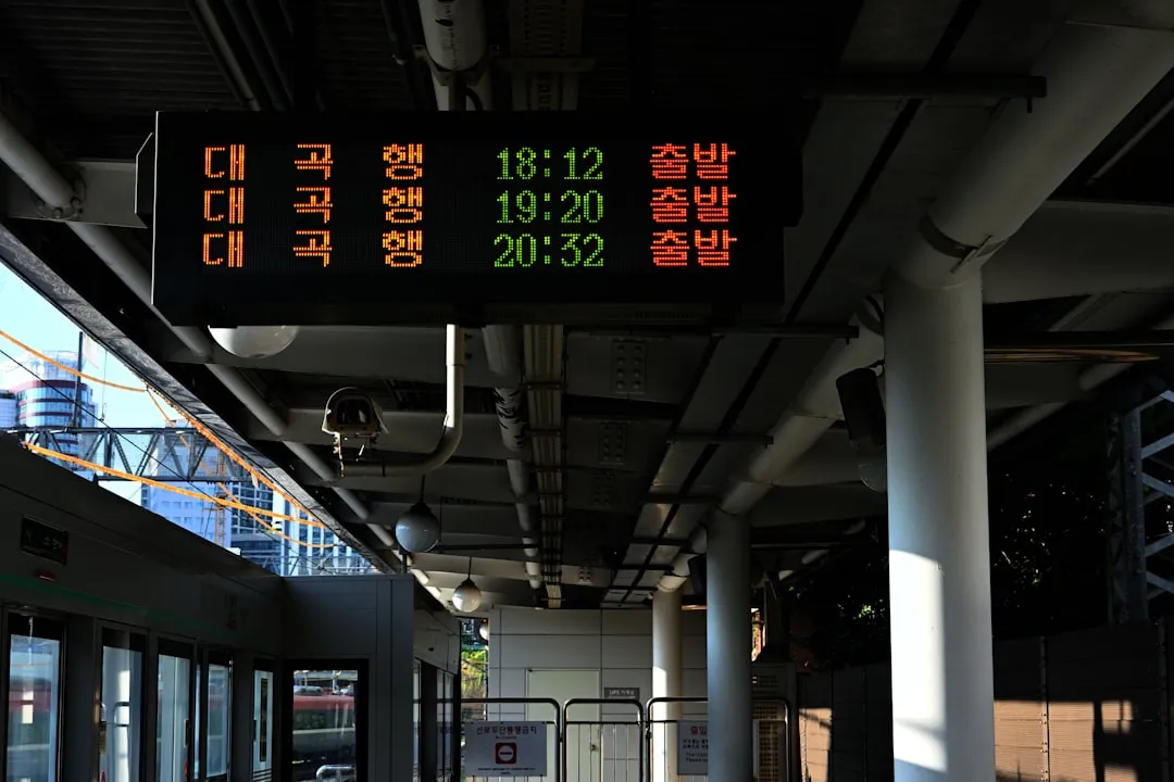 Digital display board with train schedule and times
