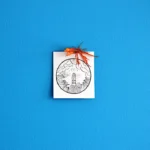 white paper sheet with ribbon