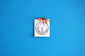 white paper sheet with ribbon