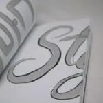 A close up of a paper with a logo on it